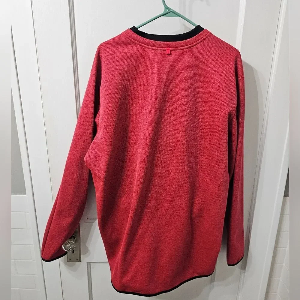 Nike golf 1/4 zip pullover over. Salmon color with black. XXL,  excellent condit